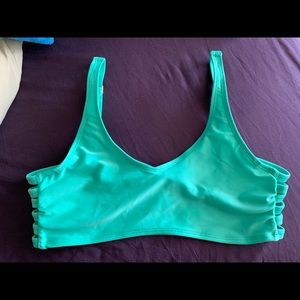 Born primitive swim top